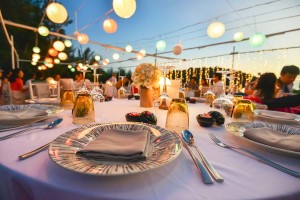 Outdoor event with Dining Tables and fun decorations.